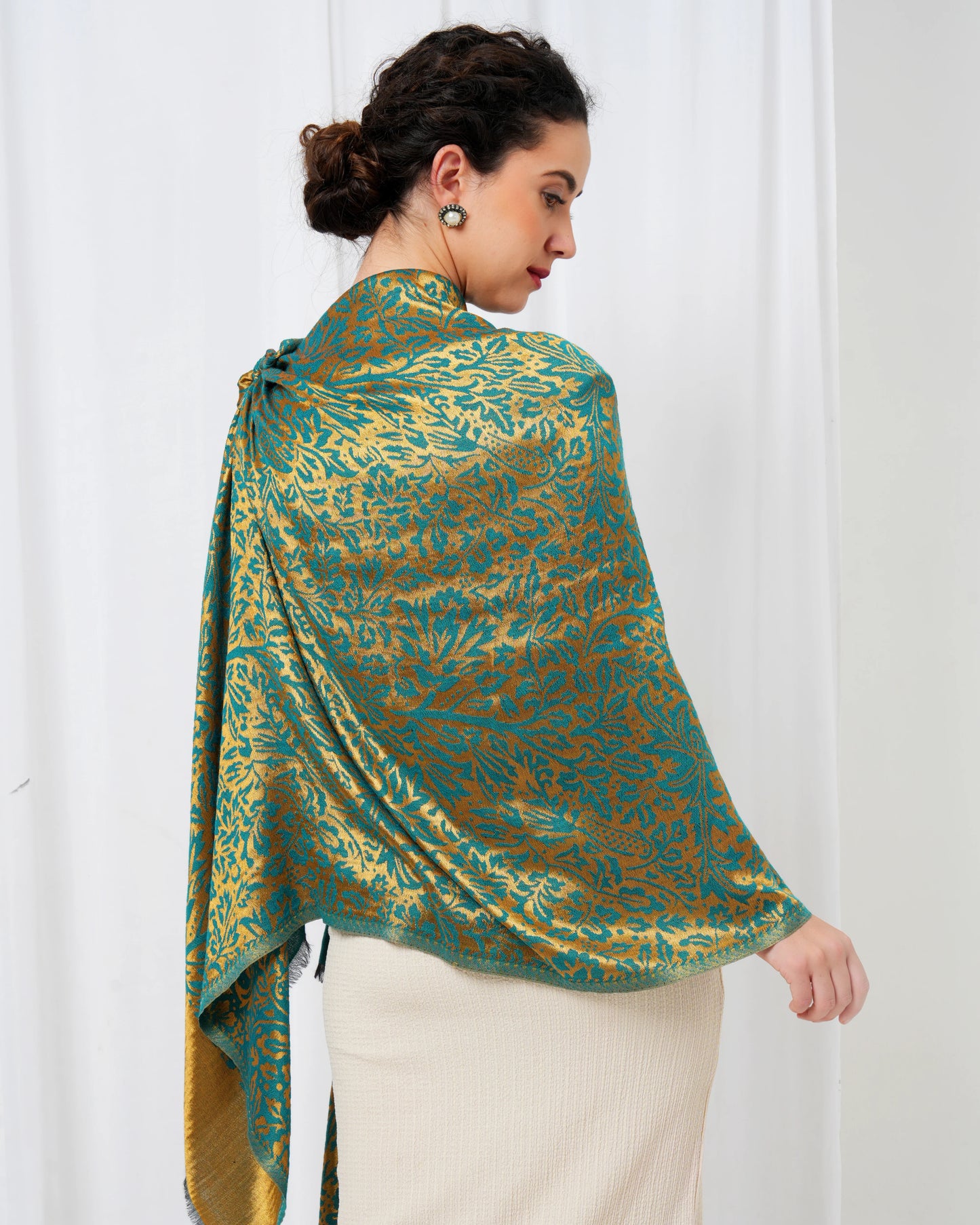 Wool stole with teal blue base with golden design