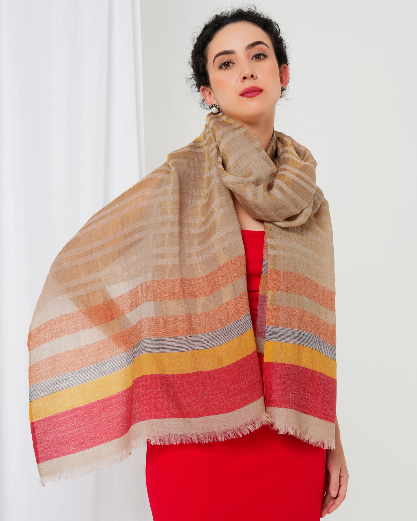 Woolen stole with cream base, and gold, orange, magenta and yellow stripes