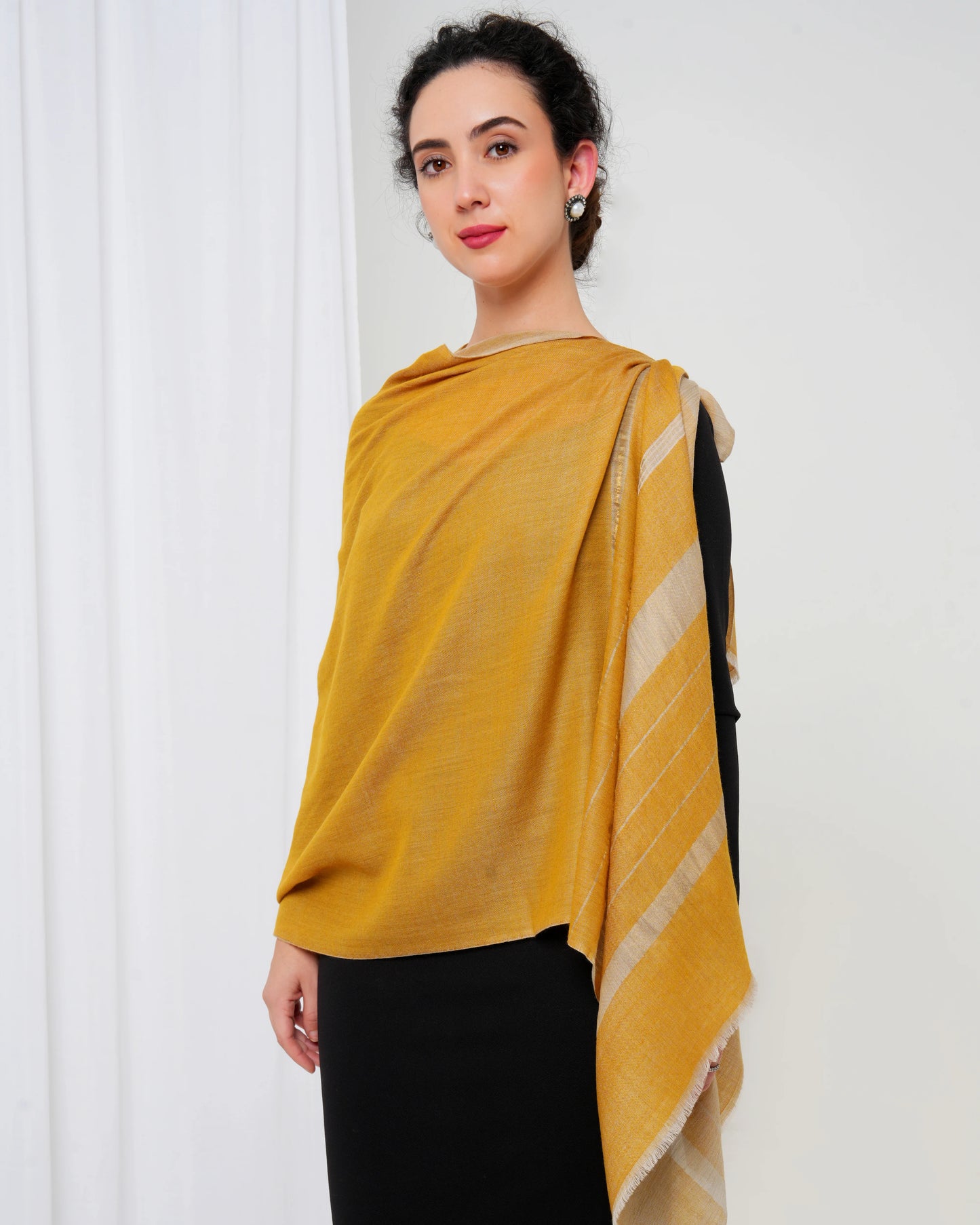 Cashmere stole in mustard colour with golden stripes