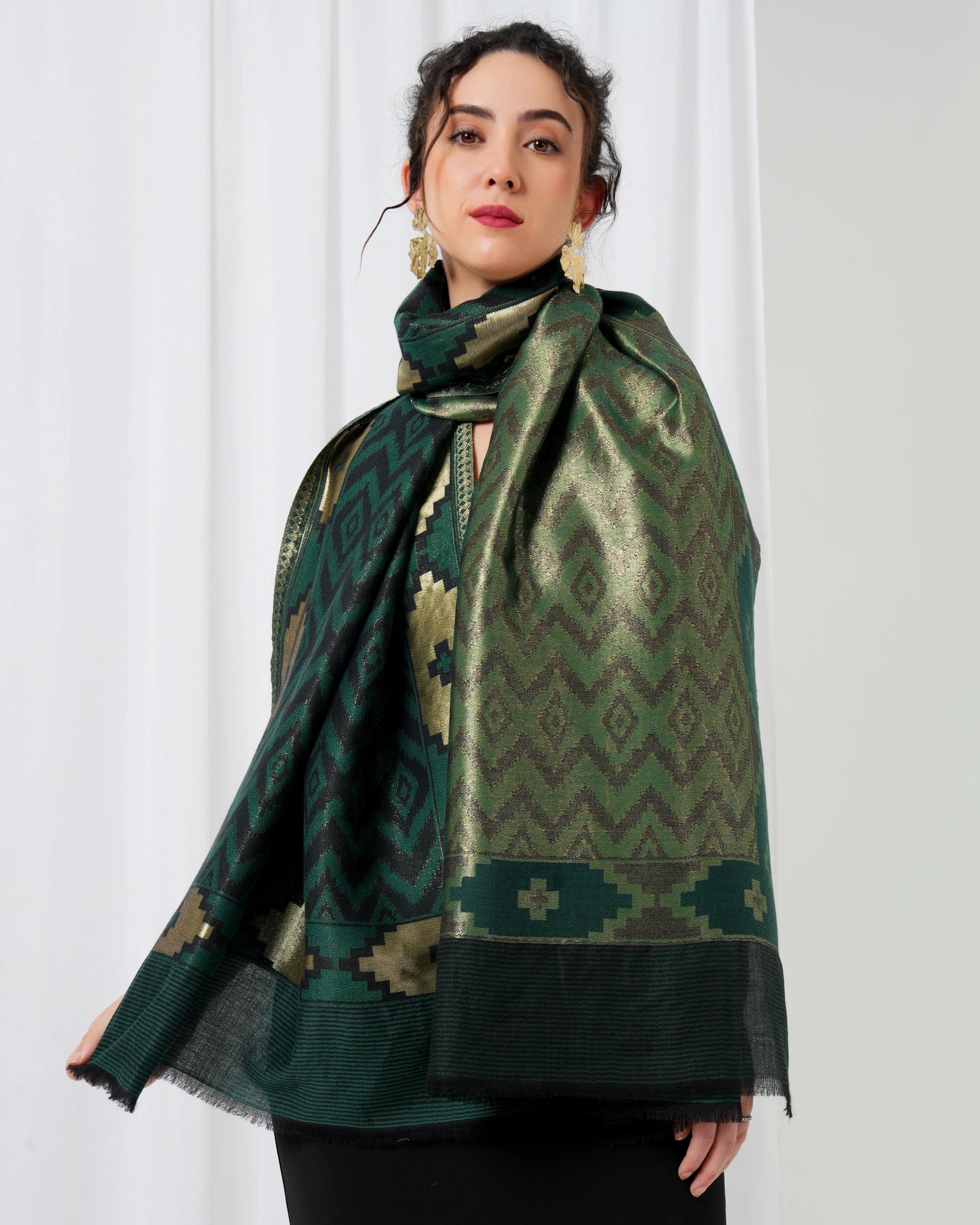 Wool stole with dark green base with black diamond design
