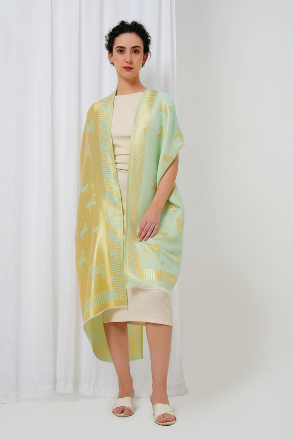 Woolen stole in gold and lime green with horse motifs