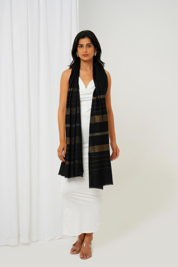 Cashmere stole in black base and multi shaped stripes in golden