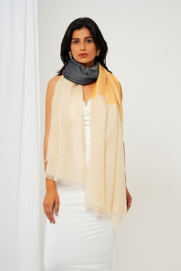 Cashmere stole with cream base, and grey and yellow highlights