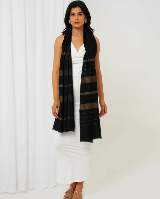 Cashmere stole in black base and multi shaped stripes in golden