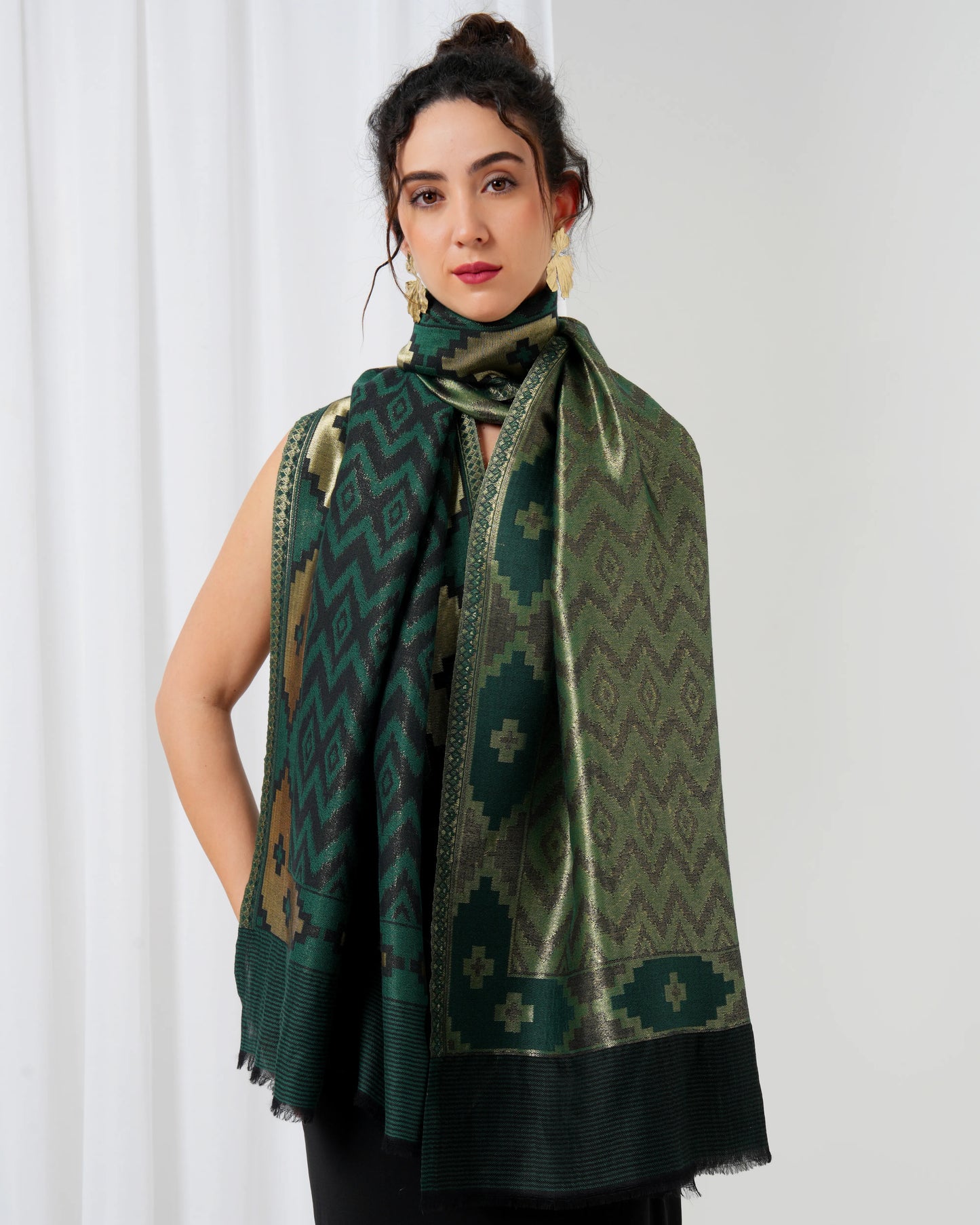 Wool stole with dark green base with black diamond design