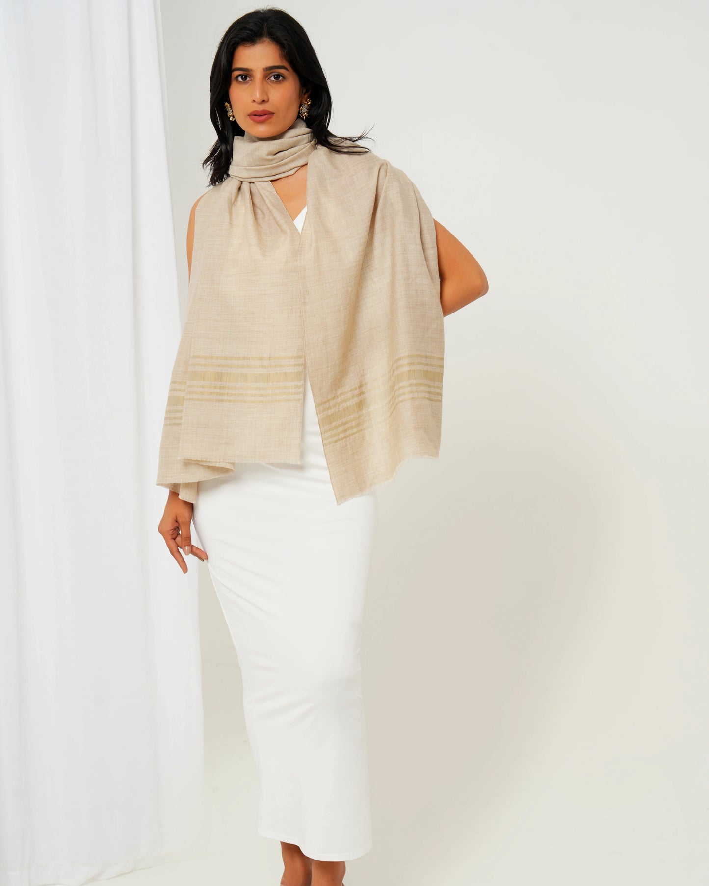 Cashmere stole in cream base with golden stripes