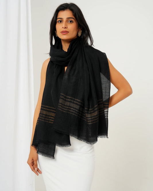 Cashmere stole in black base with golden stripes