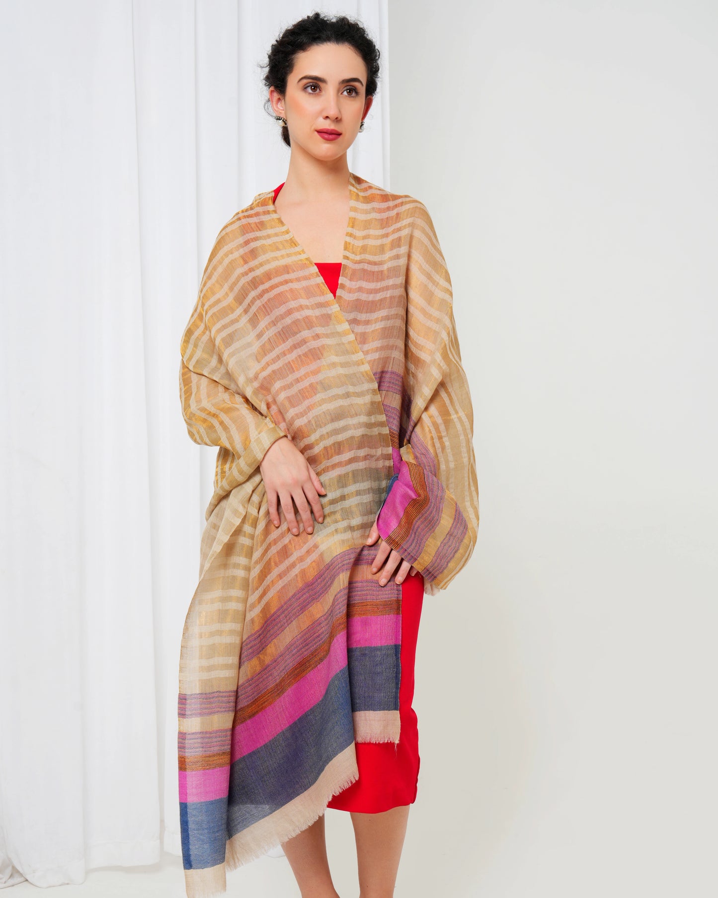 Woolen stole with cream base, and gold, pink, blue stripes