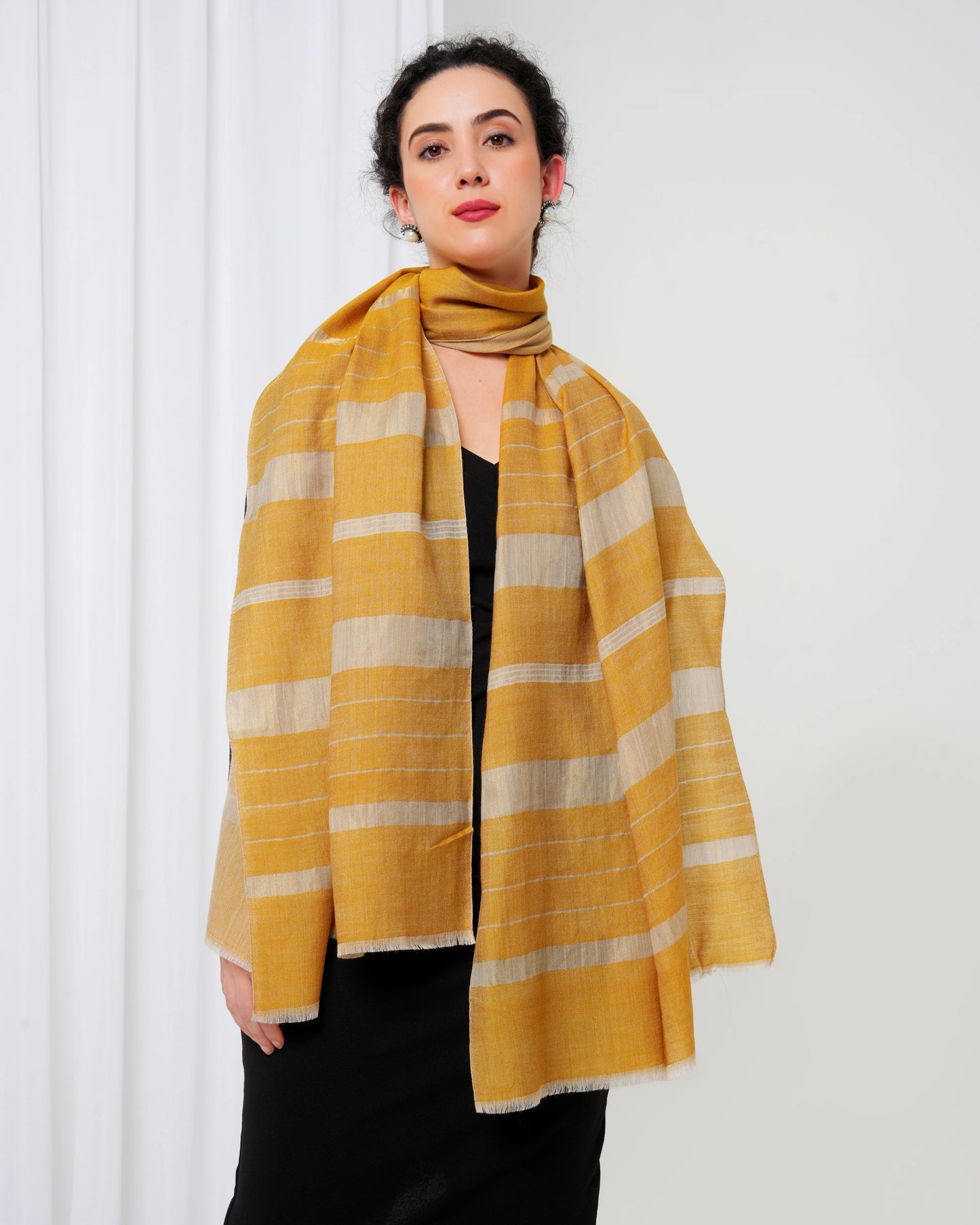 Cashmere stole in mustard colour with golden stripes