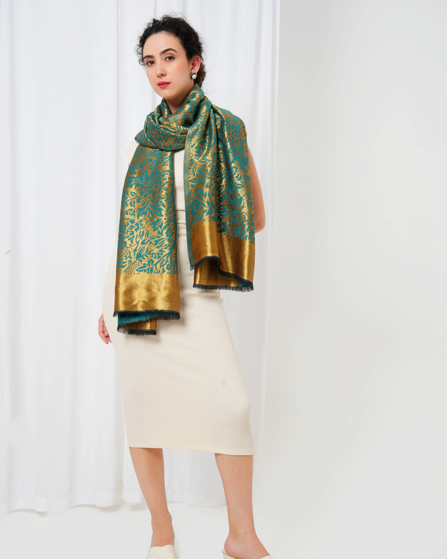 Wool stole with teal blue base with golden design