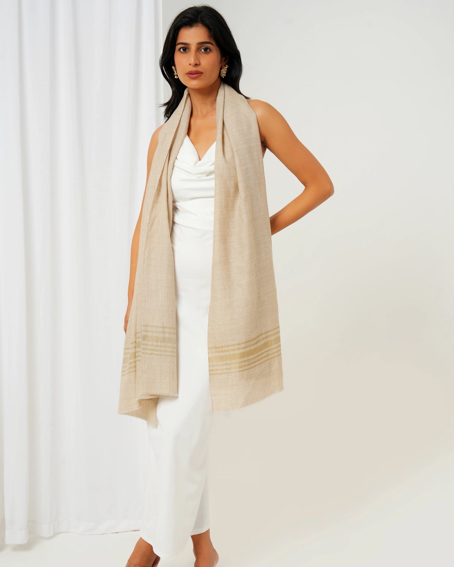 Cashmere stole in cream base with golden stripes