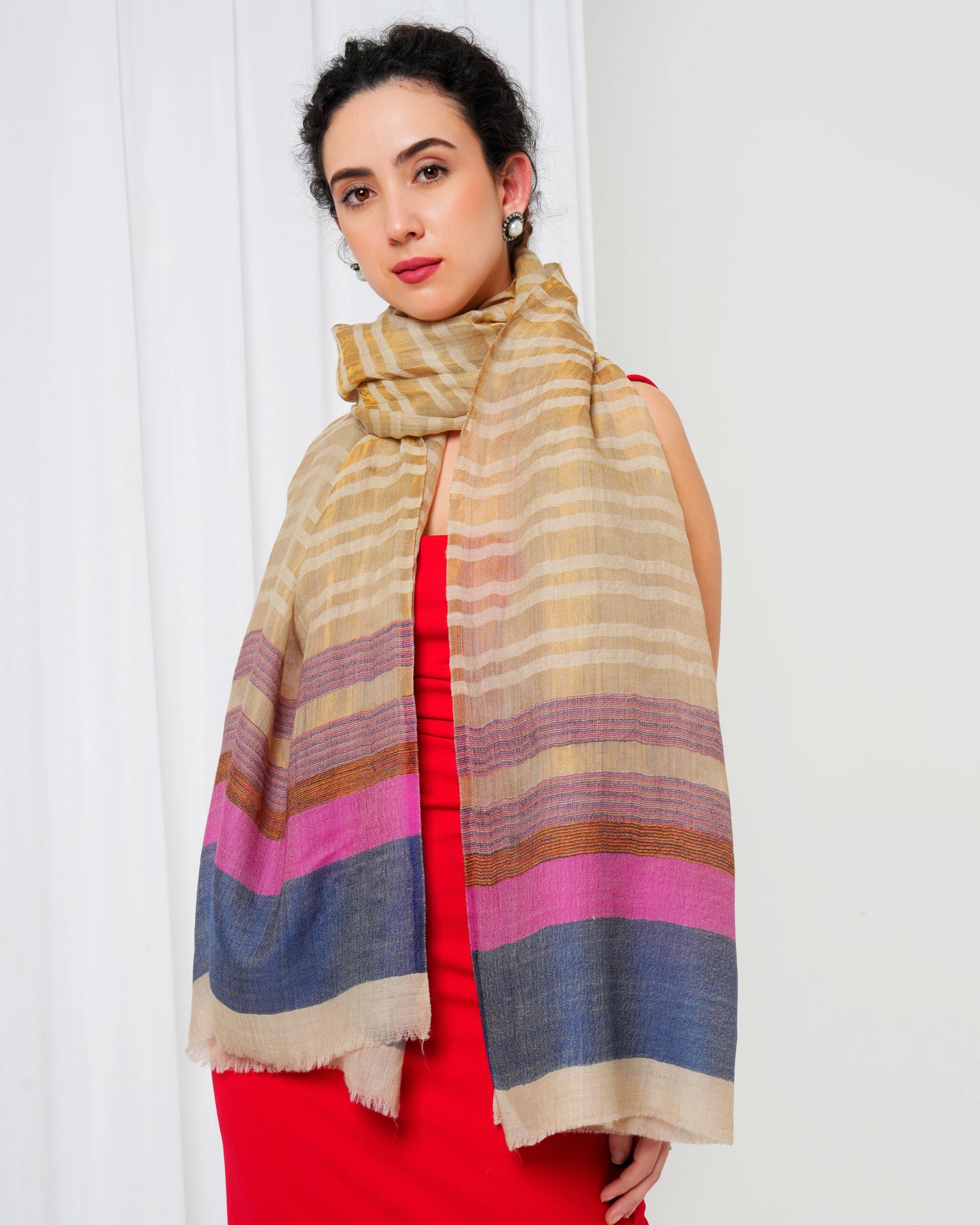 Woolen stole with cream base, and gold, pink, blue stripes