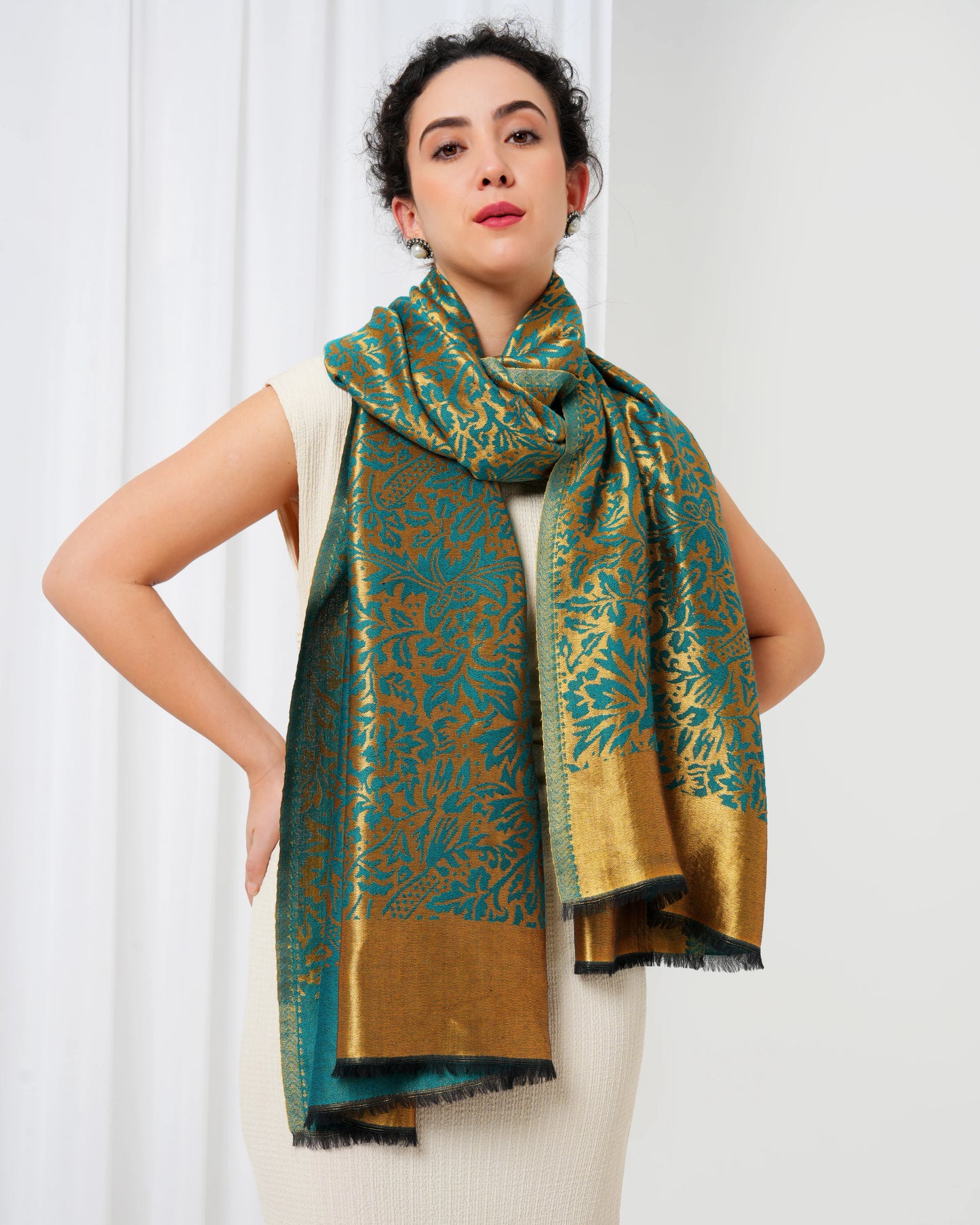 Wool stole with teal blue base with golden design