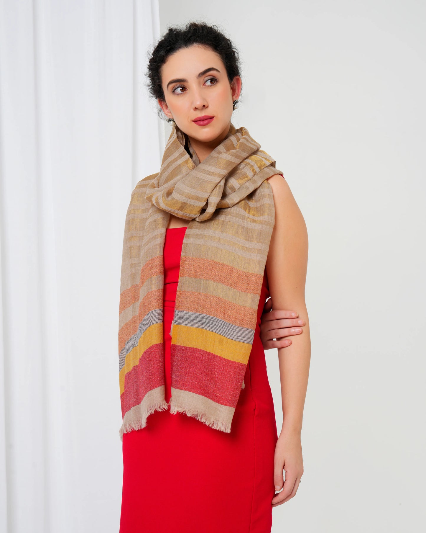 Woolen stole with cream base, and gold, orange, magenta and yellow stripes