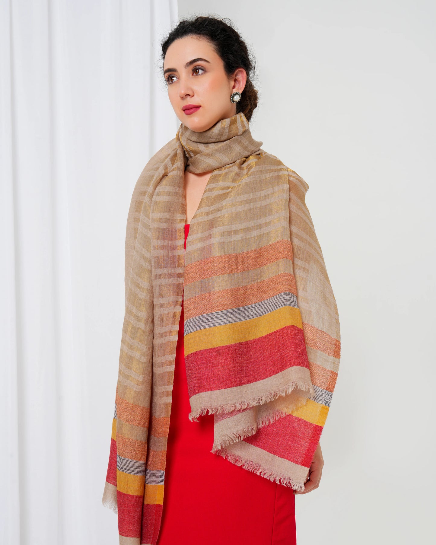 Woolen stole with cream base, and gold, orange, magenta and yellow stripes