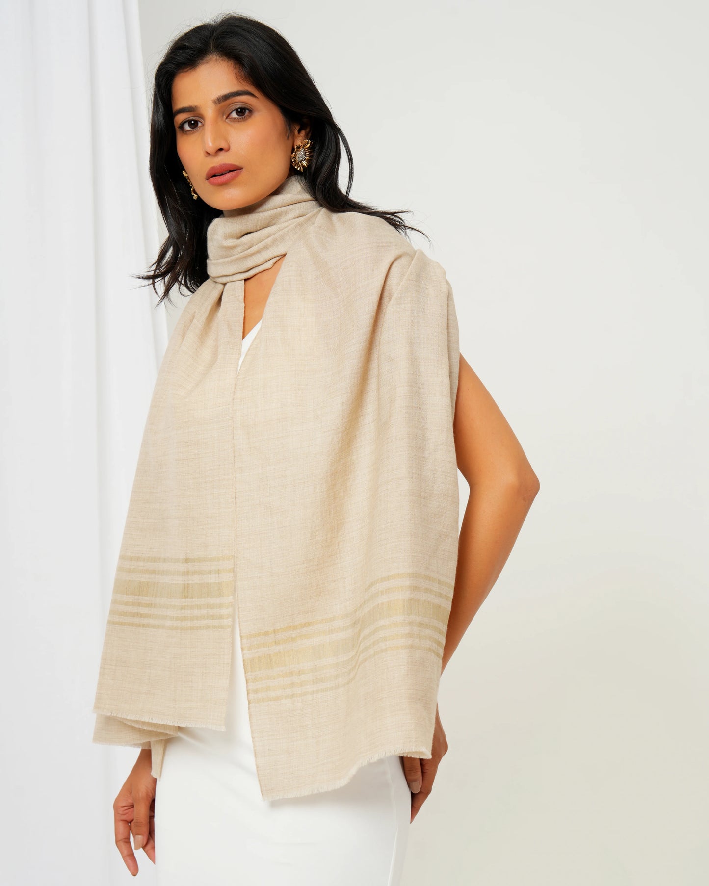 Cashmere stole in cream base with golden stripes