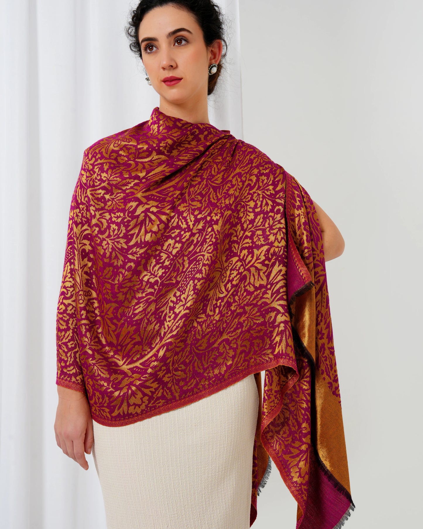 Wool stole with magenta base with golden design