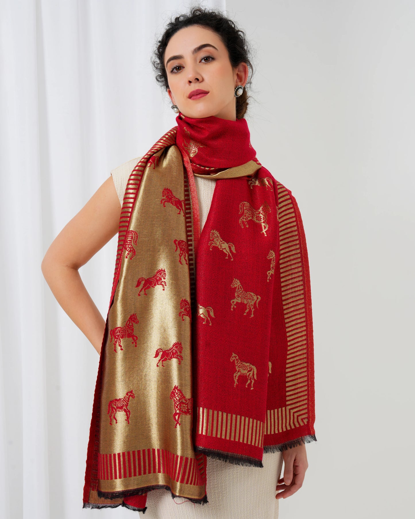 Woolen stole in gold and maroon with horse motifs