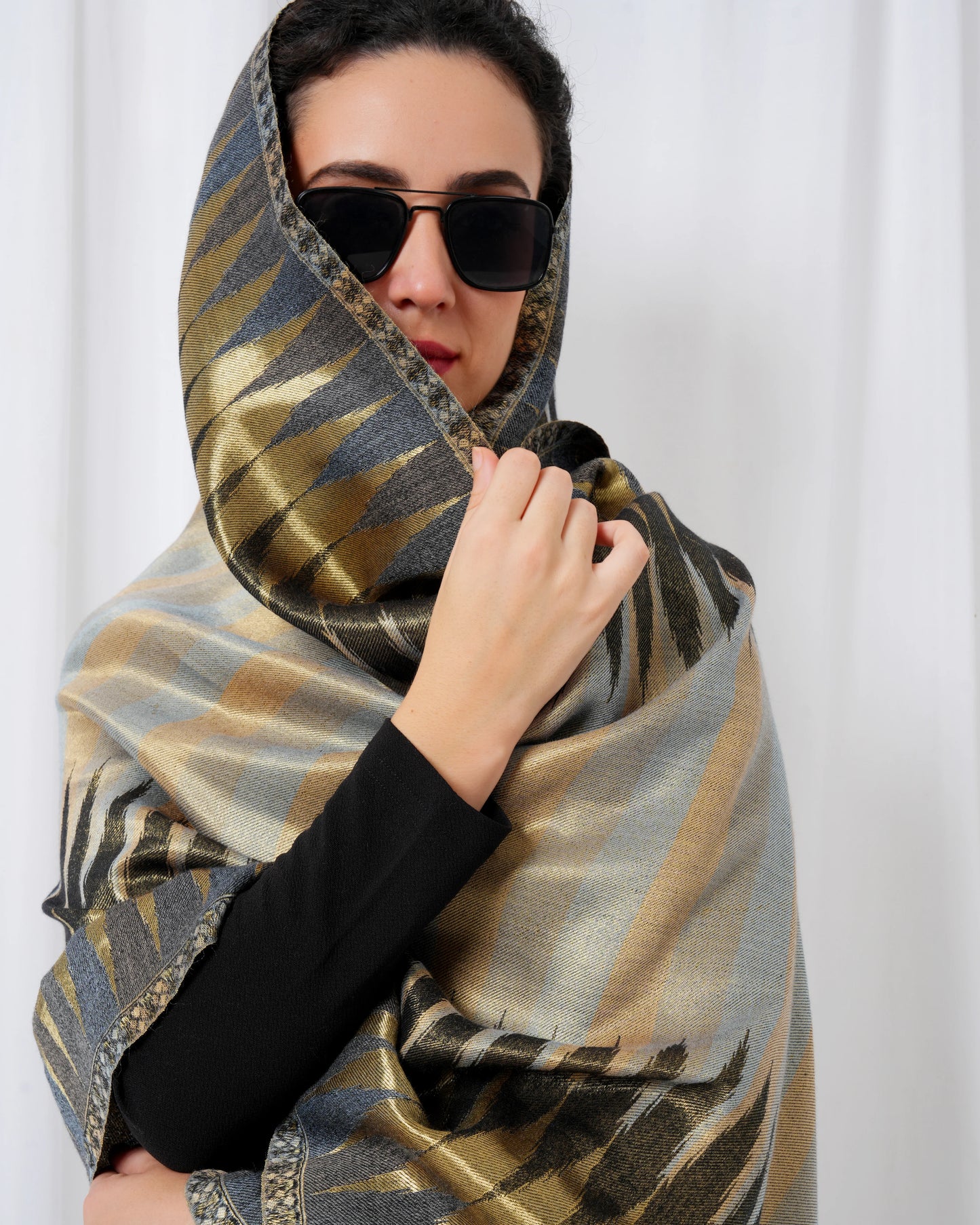 Wool stole with black base and golden design