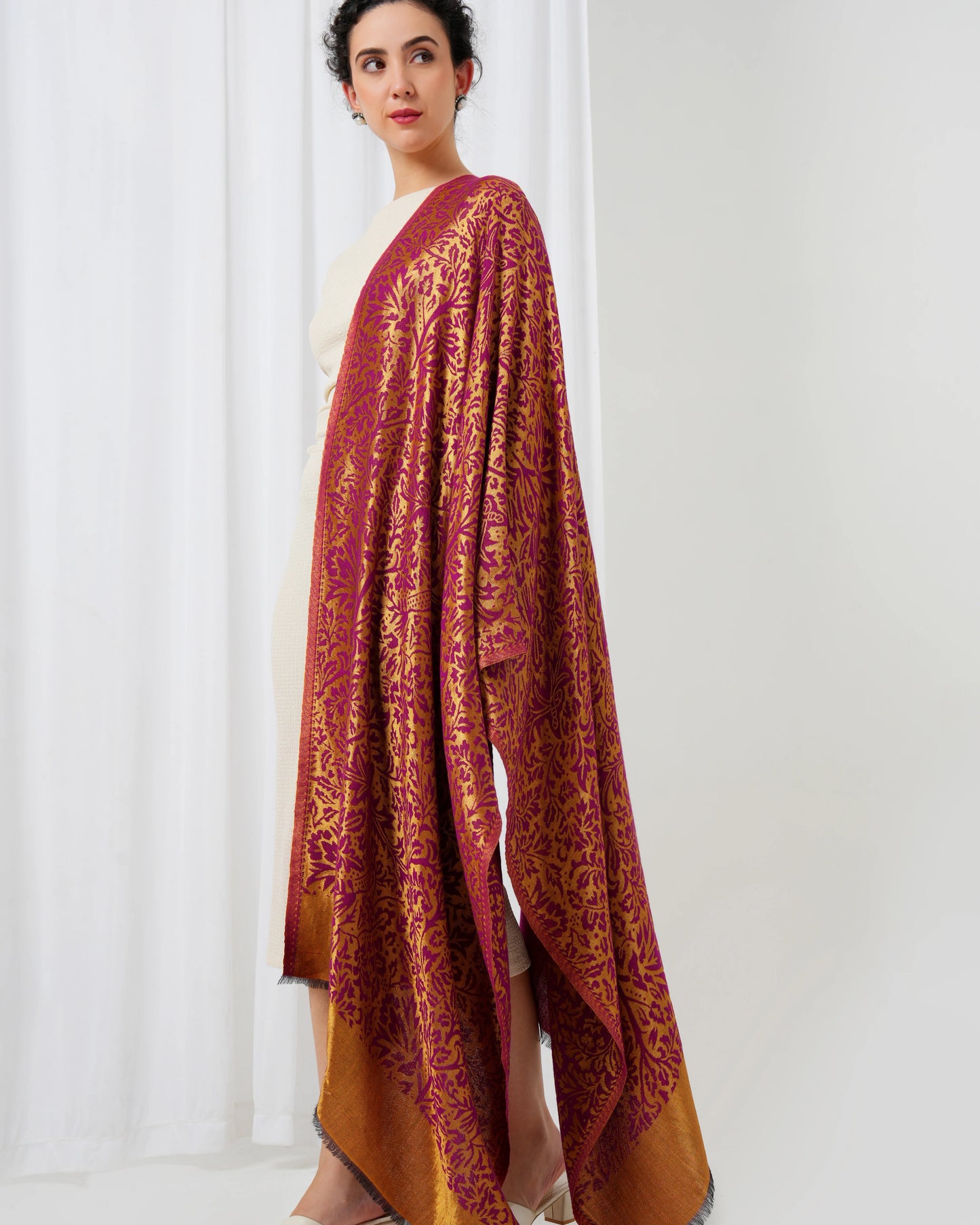 Wool stole with magenta base with golden design