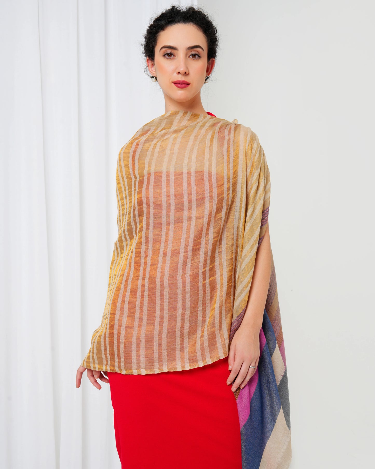 Woolen stole with cream base, and gold, pink, blue stripes