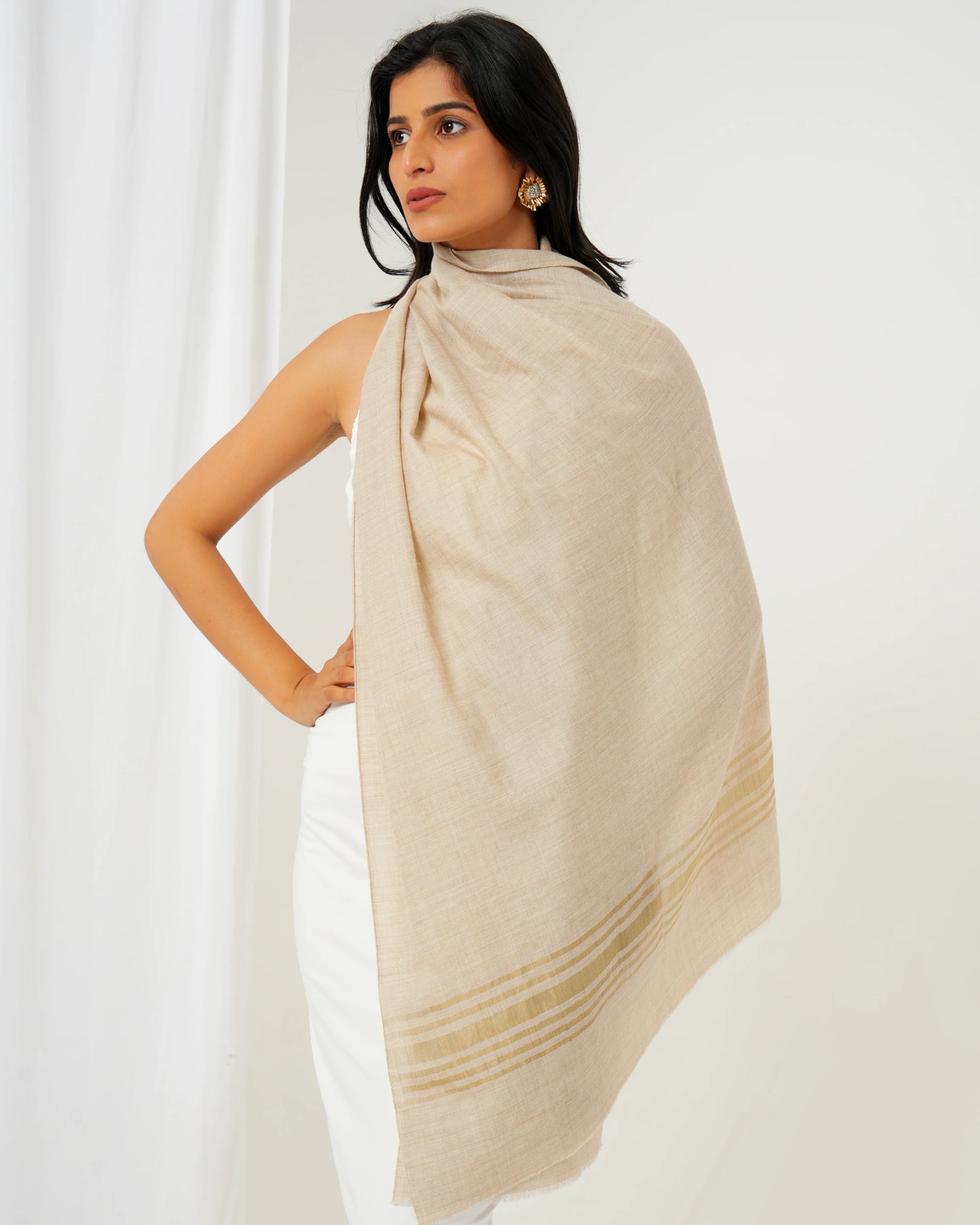Cashmere stole in cream base with golden stripes