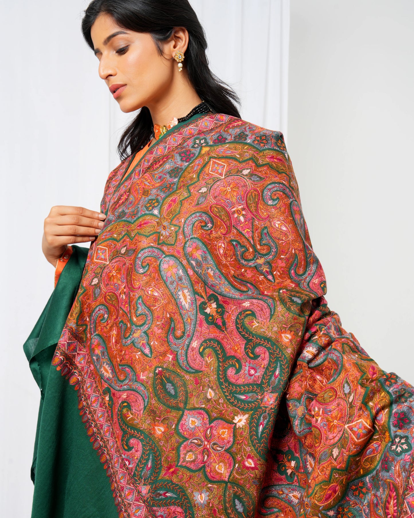 Wool shawl with green base and extravagant maroon print