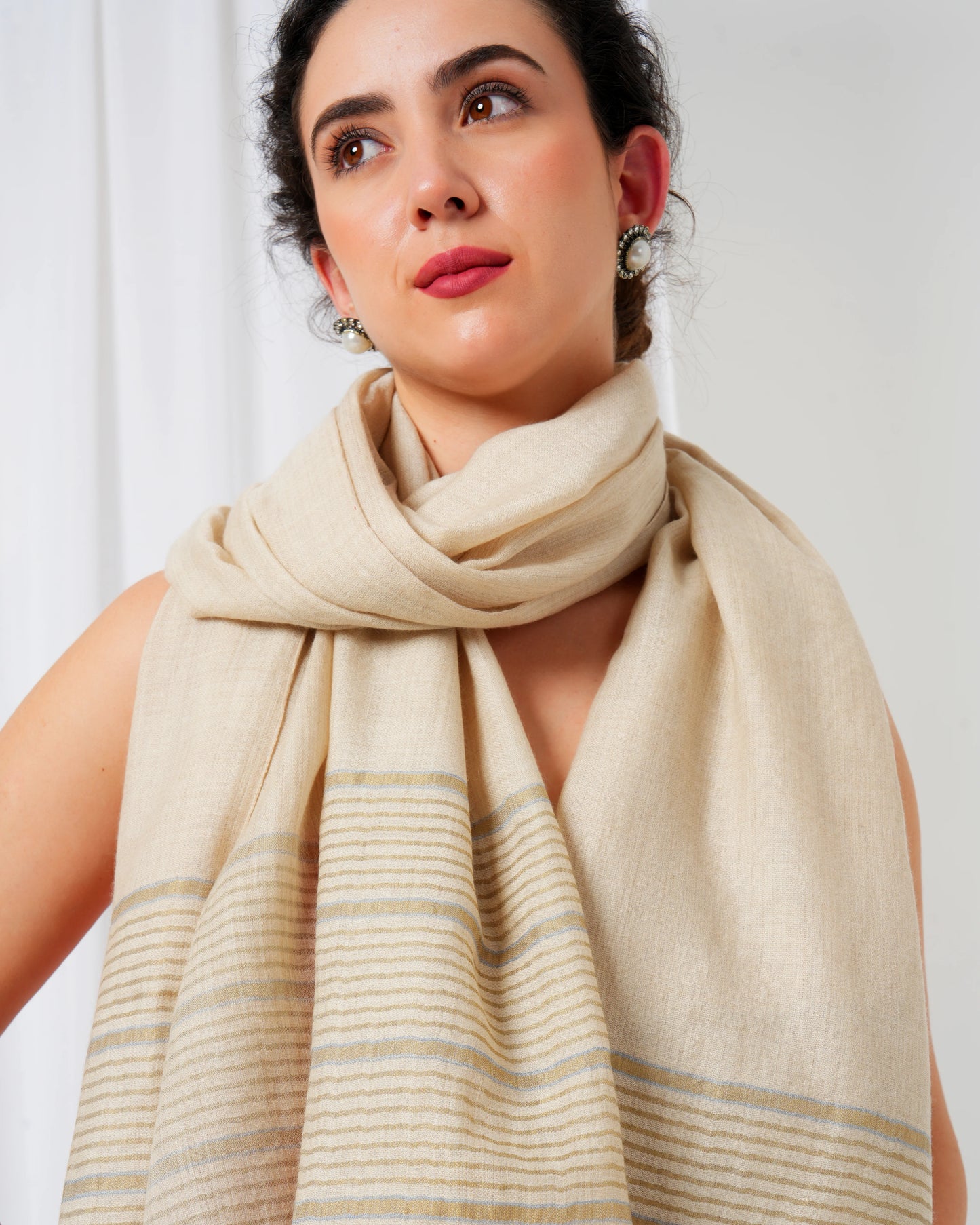 Cashmere stole in cream base with grey and gold stripes