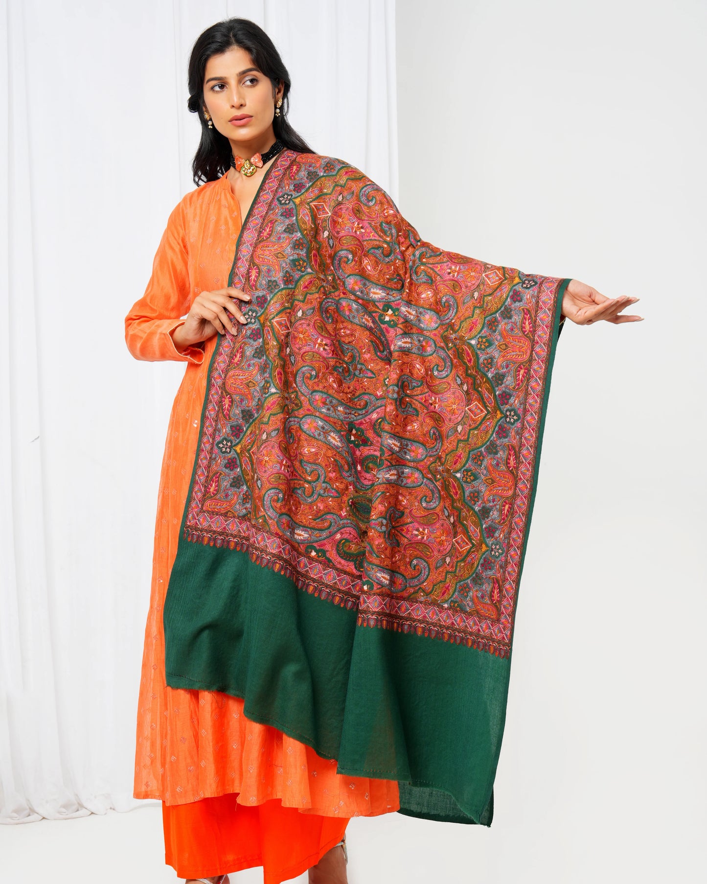 Wool shawl with green base and extravagant maroon print