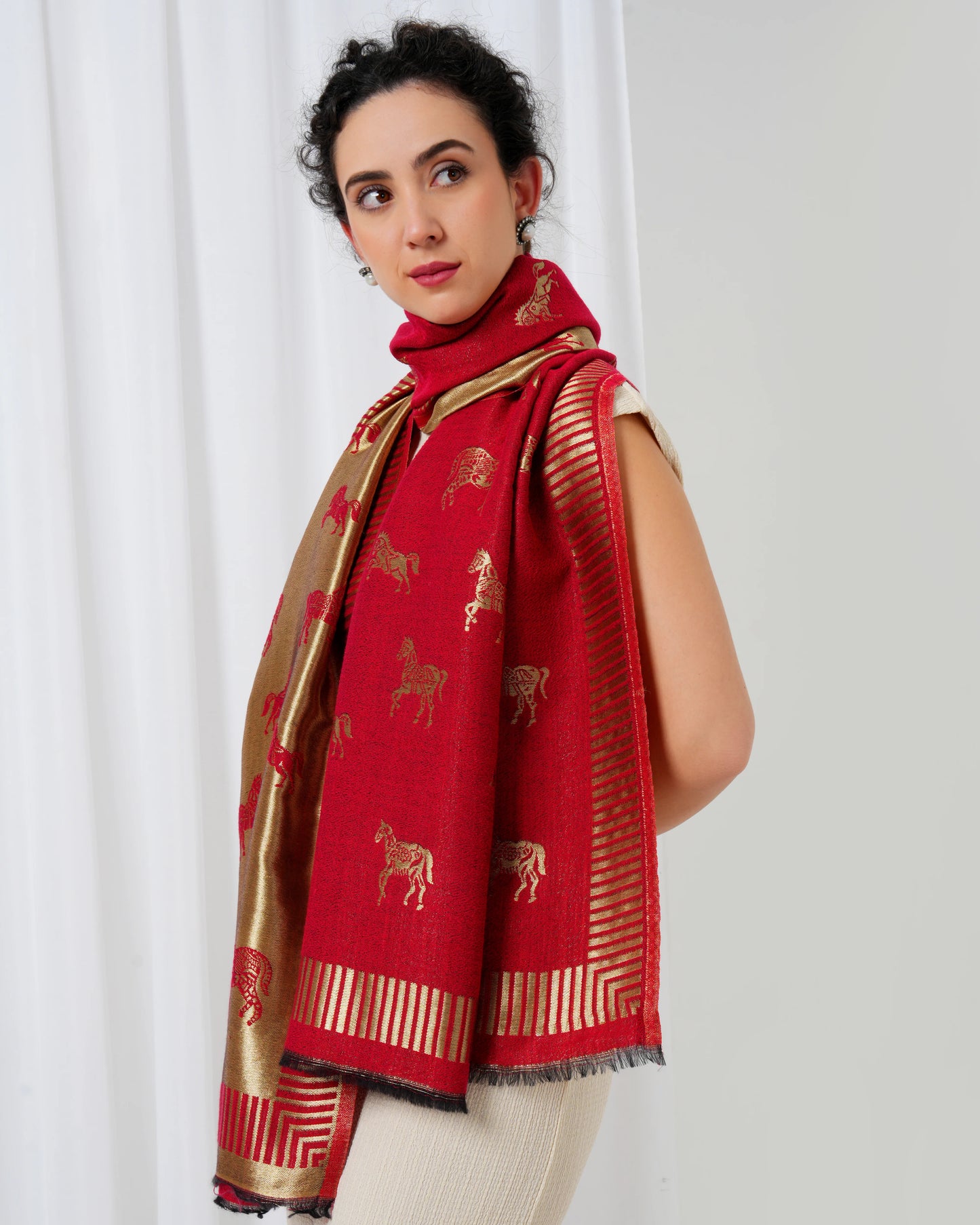 Woolen stole in gold and maroon with horse motifs