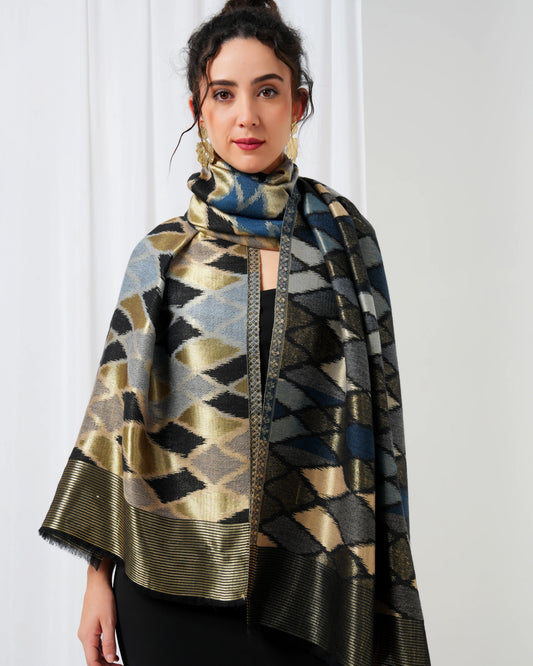 Woman wearing a patterned scarf against a white background